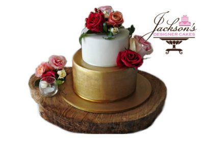 White & Gold Wedding Cake with Roses