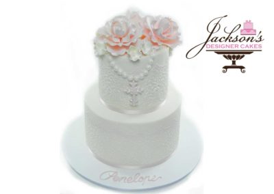 White Baptism Cake with pink flowers